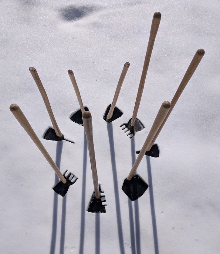 Trail tools huddling together for warmth